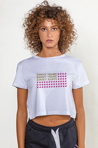 T-shirt corta girocollo donna in cotone tinta unita con stampa multicolor.